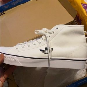 Men’s adidas shoes size 9 or women’s 10.5